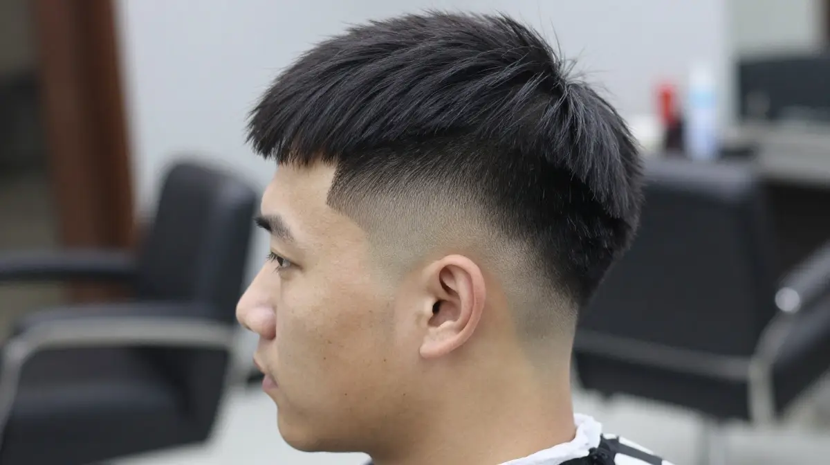 Subtle Mullet with Low Skin Fade and Soft Top